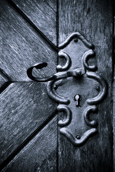 stock image Retro keyhole in old wooden door