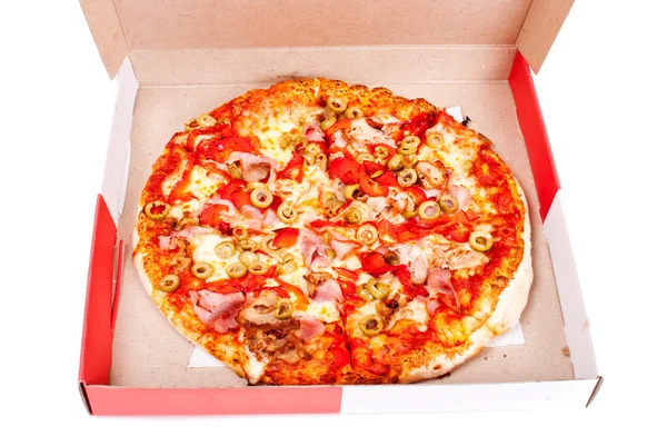 Excellent pizza in box with mozzarella, ham, pork, pickled peppe — Stock Photo, Image