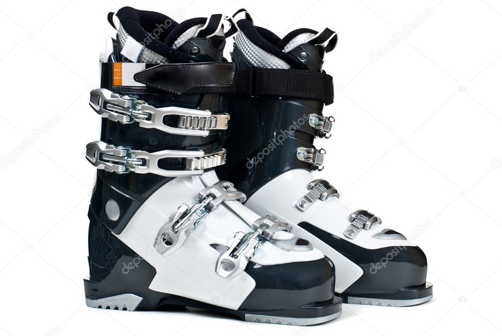 Modern professional ski boots isolated on white background