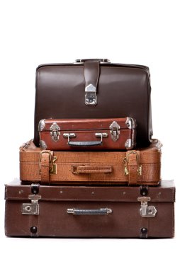 Old suitcases isolated on a white background clipart