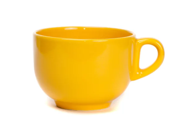 白い背景上に分離されて黄色のカップ — ストック写真