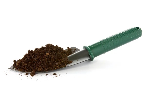 Garden spade with soil — Stock Photo, Image