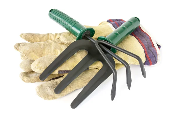 Work gloves with garden tools — Stock Photo, Image