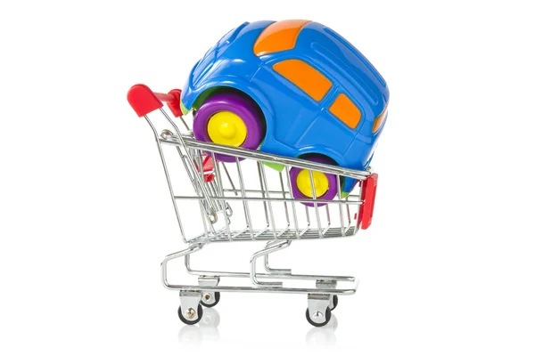 Plastic toy car in a shopping cart — Stock Photo, Image