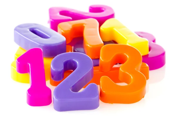 Números coloridos de plástico sortidos — Fotografia de Stock