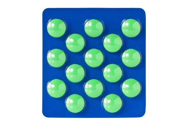Green pills in blister — Stock Photo, Image