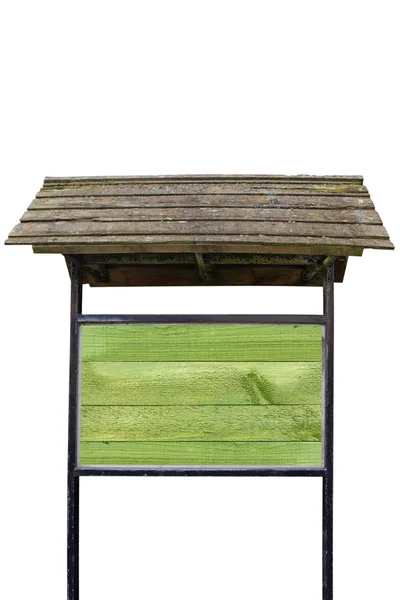 Groene houten bord met oud dak — Stockfoto