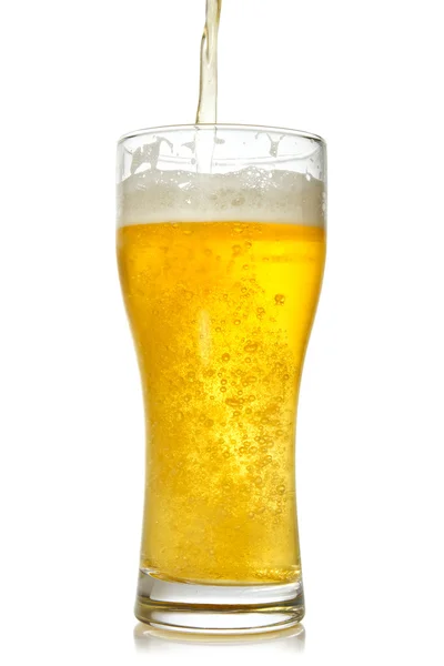Cold beer pouring into glass — Stock Photo, Image