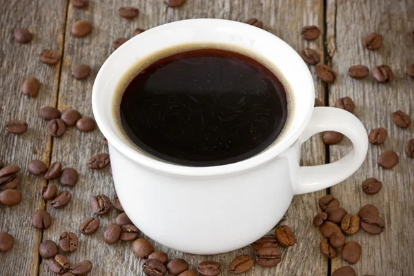 Csésze kávé a fa háttér — Stock Fotó