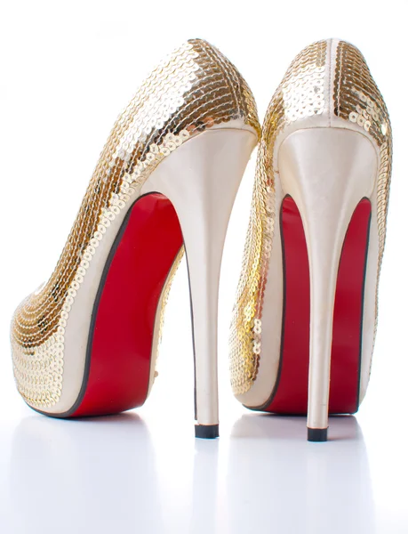 Dámské boty se zlatými flitry — Stock fotografie