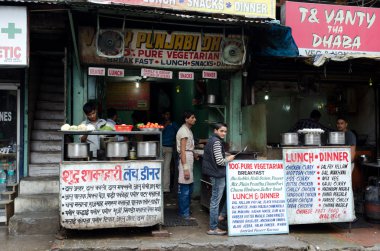 Dhabas as roadside food stalls in New Delhi clipart