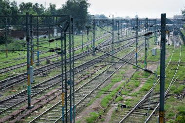 Tracks of the Indian railway on a station clipart