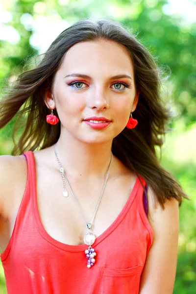 Pretty caucasian young woman in red dress — Stock Photo, Image