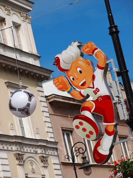 Euron 2012 maskot på krakowskie przedmiescie i Warszawa, Polen — Stockfoto