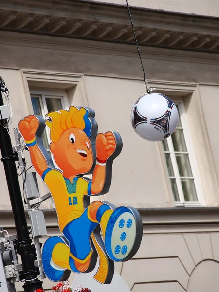 Euron 2012 maskot på krakowskie przedmiescie i Warszawa, Polen — Stockfoto