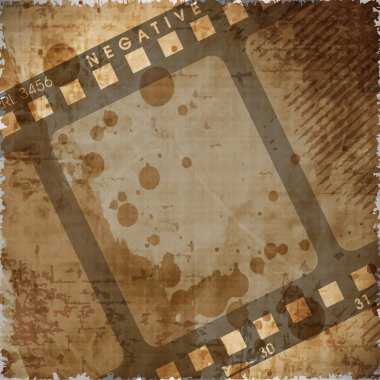 Illustration of a film stripe or film reel on grungy brown movie background. EPS 10 clipart