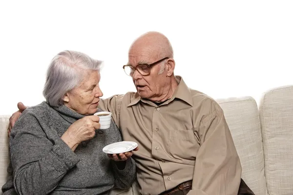 Starší pár, pití kávy — Stock fotografie