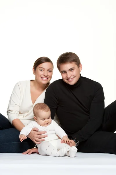 Família feliz isolado no fundo branco — Fotografia de Stock