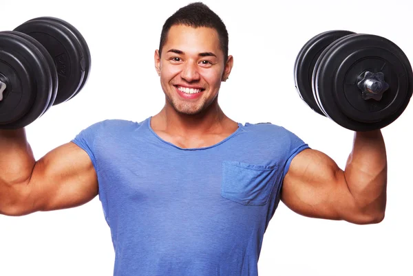 Portrait of muscle man on white background with dumbbels — Stock Photo, Image