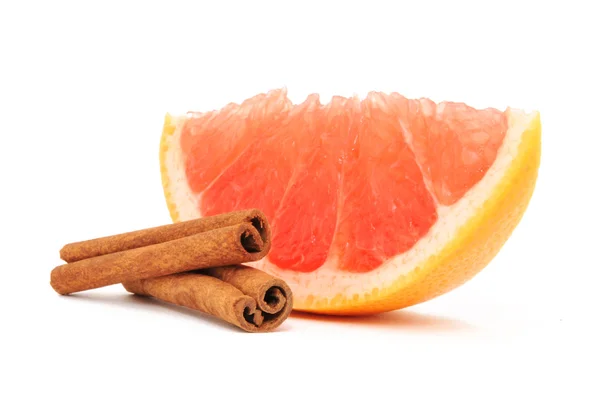 Grapefruit and cinnamon — Stock Photo, Image