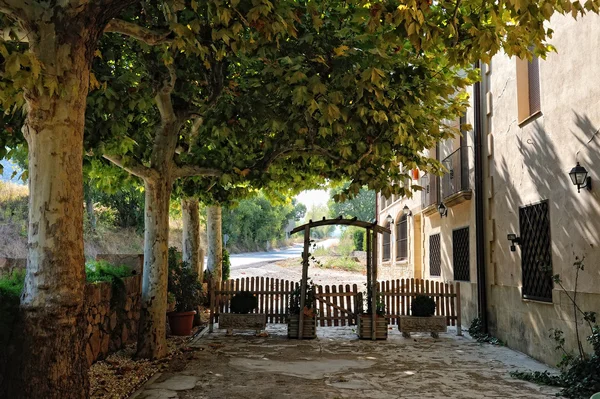 stock image Scenic patio of the small spanish countryhouse. Near the monast