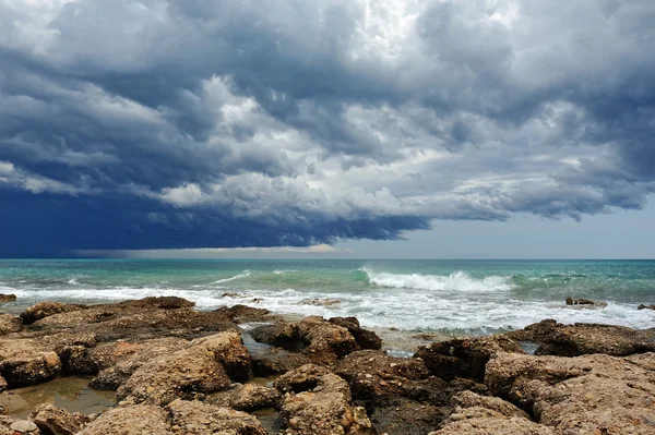 stock image Sea landscape with rocky coast and storm sky .