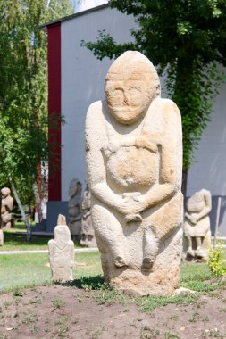 Stone polovtsian sculpture in park-museum of Lugansk, Ukraine clipart
