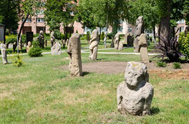 Stone polovtsian sculptures in park-museum of Lugansk, Ukraine clipart