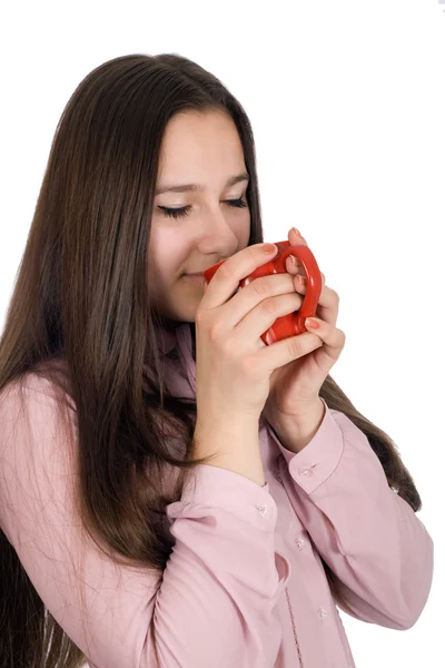 Portret van een mooi meisje met een kopje koffie in de hand — Stockfoto