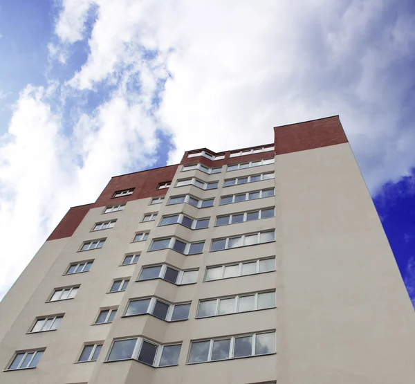 stock image Apartment building over blue sky