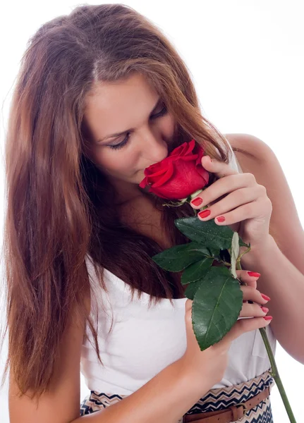 Mädchen mit roter Rose — Stockfoto