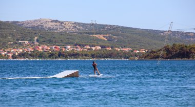 Cable ski in the Punat sea, Croatia clipart