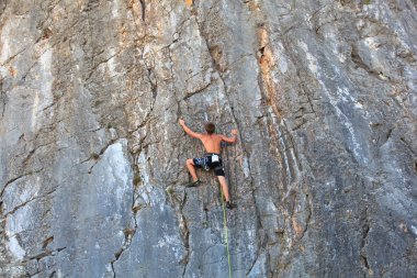 Climber on Sistiana rock, Trieste clipart