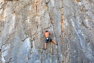 Climber on Sistiana rock, Trieste clipart