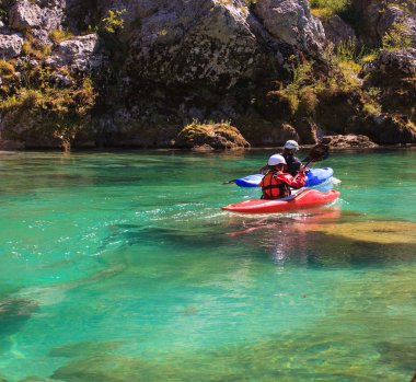 Kayaking on the Soca river, Slovenia clipart