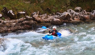 Kayaking on the Soca river, Slovenia clipart