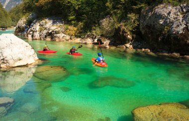 Kayaking on the Soca river, Slovenia clipart