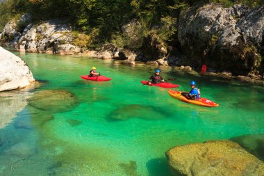 Kayaking on the Soca river, Slovenia clipart