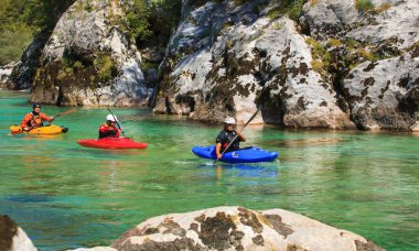 Kayaking on the Soca river, Slovenia clipart