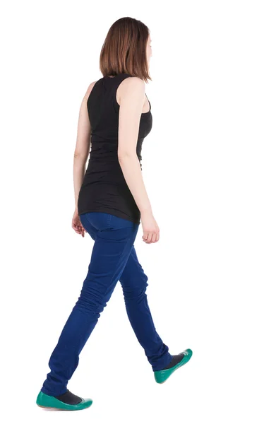 Back view of walking brunette girl — Stock Photo, Image