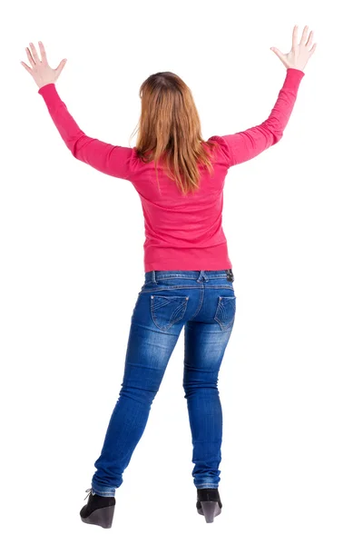 背面図の美しいブルネットの女性のジーンズ. — ストック写真