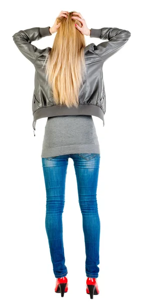 Back view of shocked woman in gray jacket — Stock Photo, Image