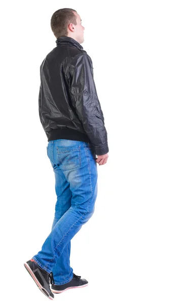 Vista posterior de caminar tan guapo en chaqueta. —  Fotos de Stock