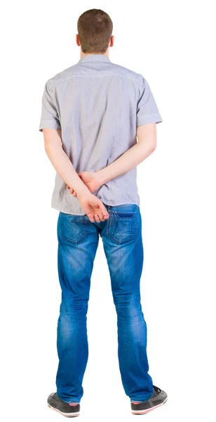 Bakifrån av unga män i skjorta och jeans. — Stockfoto