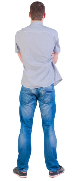 Vista posteriore di giovani uomini in camicia e jeans . — Foto Stock