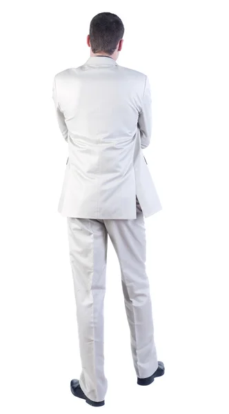 Back view of Business man looks ahead. — Stock Photo, Image