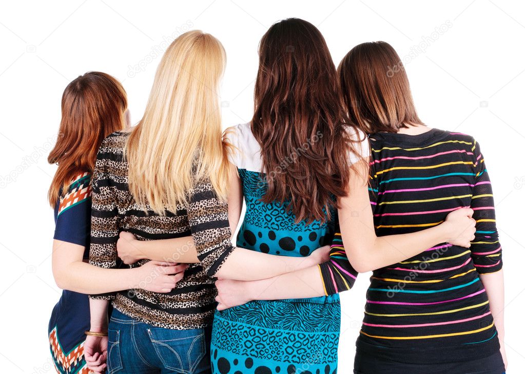 Back view of group of young women discussing and watching .