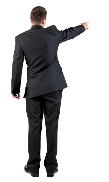Back view of pointing business man. — Stock Photo, Image