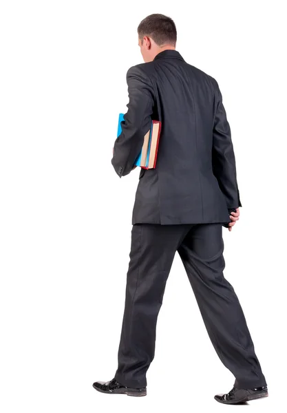 ビジネスの男性との本歩行の背面図 — ストック写真