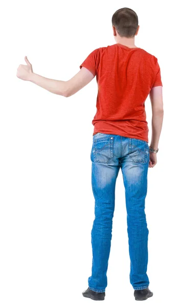 备份年轻男子在橙色 t 恤去拇指的视图. — 图库照片